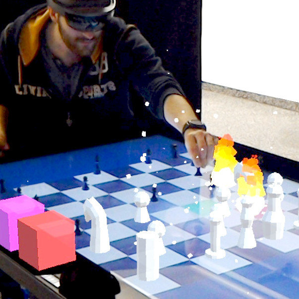 Thumbnail for CheckMate: Exploring a Tangible Augmented Reality Interface for Remote Interaction